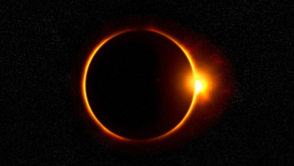 total solar eclipse on a starry background